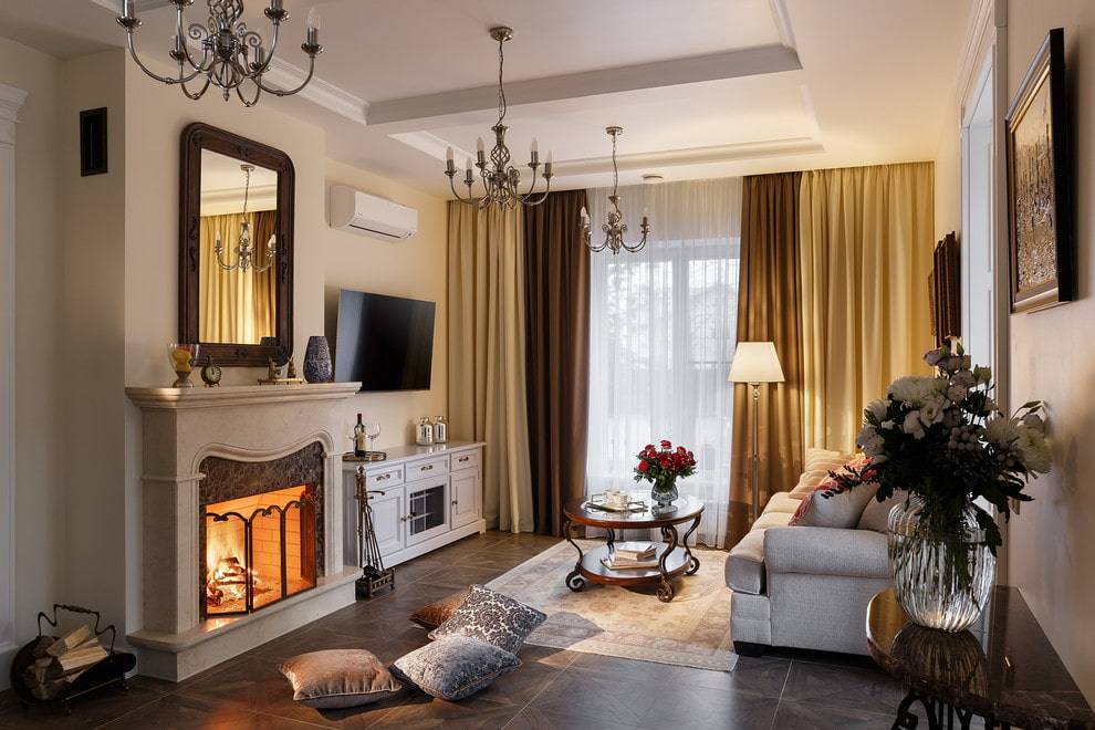 Гостиная с камином: современный стиль интерьера в частном доме с декоративным, белым или угловым биокамином и электрокамином
 - 61 фото