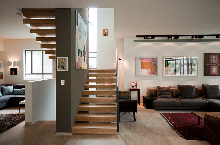 Дизайн гостиной с лестницей: плюсы, минусы и варианты оформления