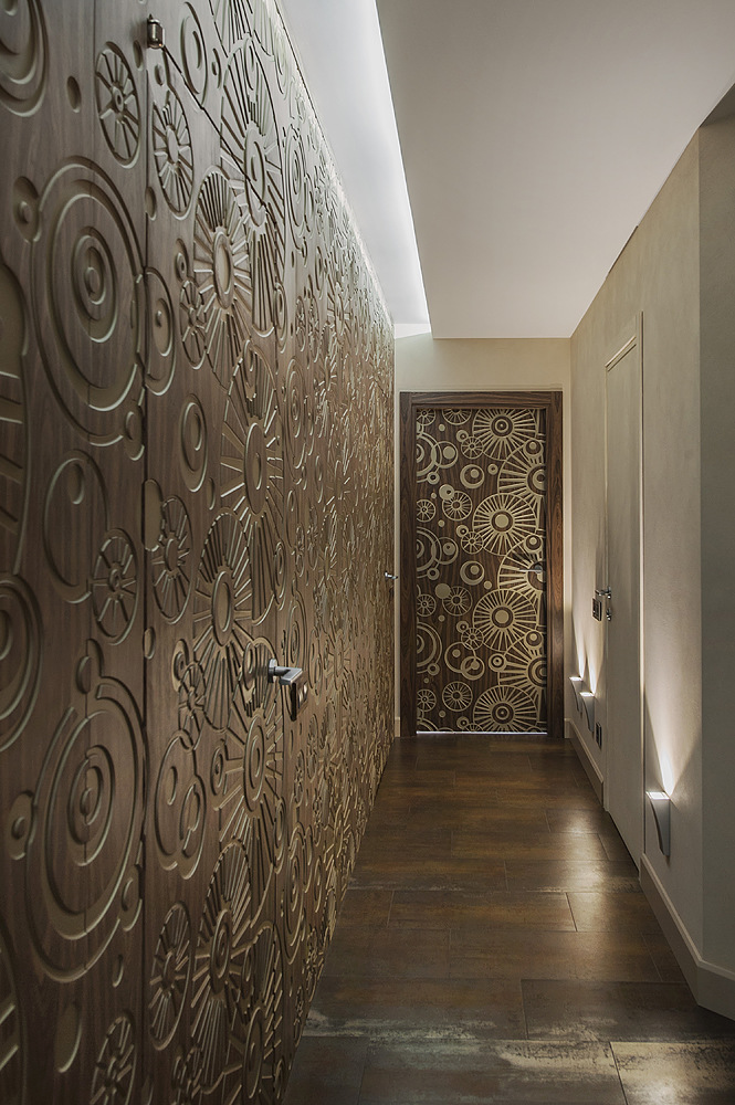 Варианты отделки стен в коридоре и прихожей: обои, декоративная плитка и камень